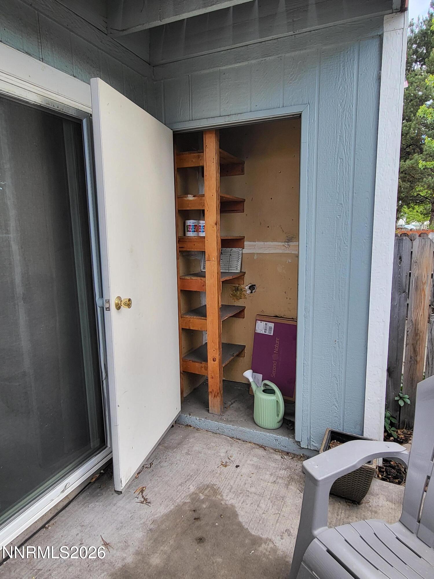 4606 Neil Road, Unit 197 Reno, NV 89502 - Photo 15 of 26 a view of walk in closet with clothes and shoes