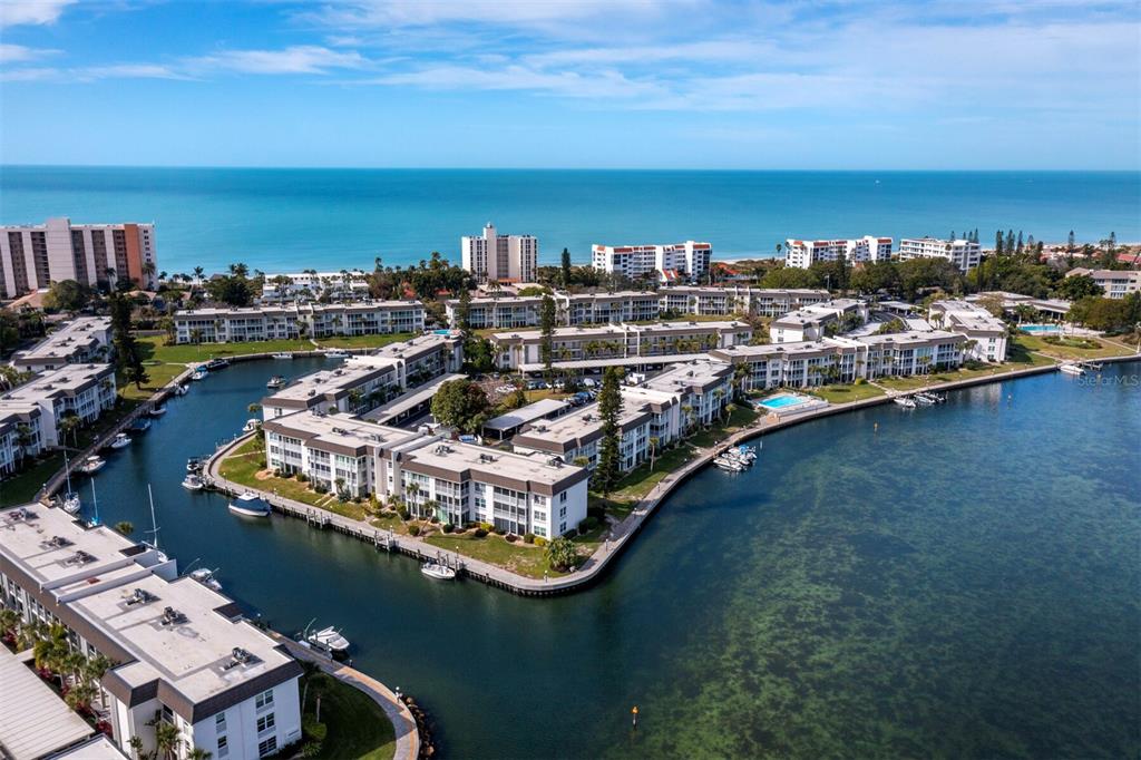 4430 Exeter Drive, Unit 106 Longboat Key, FL 34228 - Photo 30 of 57 a view of a city with an ocean