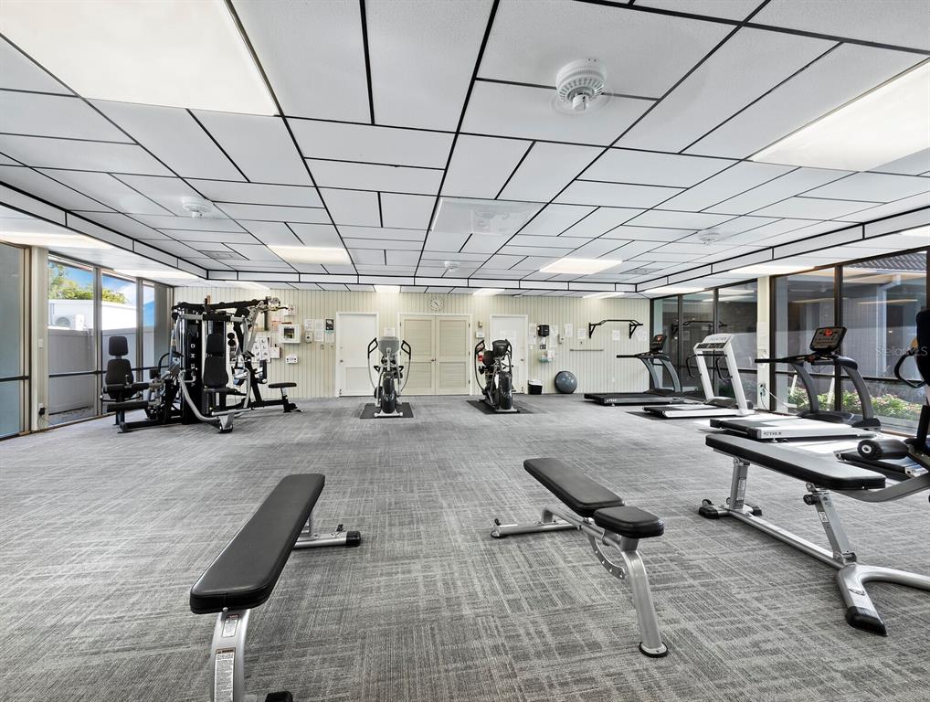 4430 Exeter Drive, Unit 106 Longboat Key, FL 34228 - Photo 39 of 57 a view of a room with gym equipment