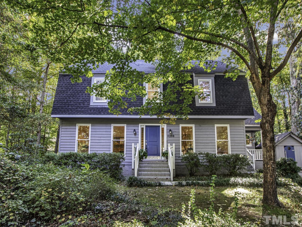 4208 Webster Court Raleigh, NC 27609 - Photo 1 of 28 front view of a house with a tree