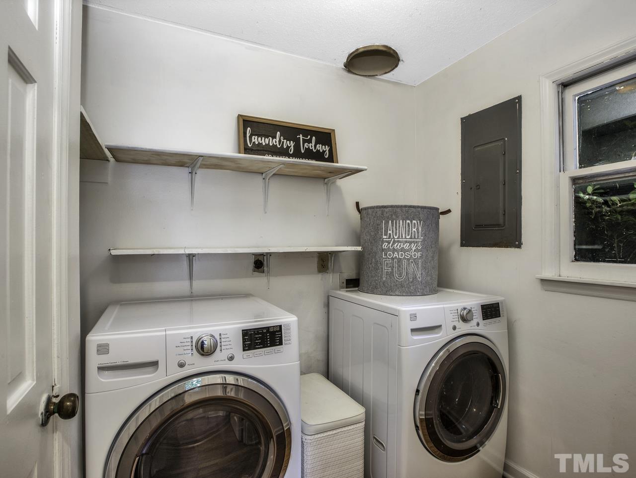 4208 Webster Court Raleigh, NC 27609 - Photo 23 of 28 a utility room with dryer and washer