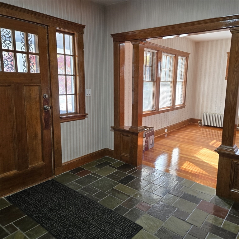 22 Hope Avenue, Unit 22 Milton, MA 02186 - Photo 1 of 36 a view of an entryway with a window
