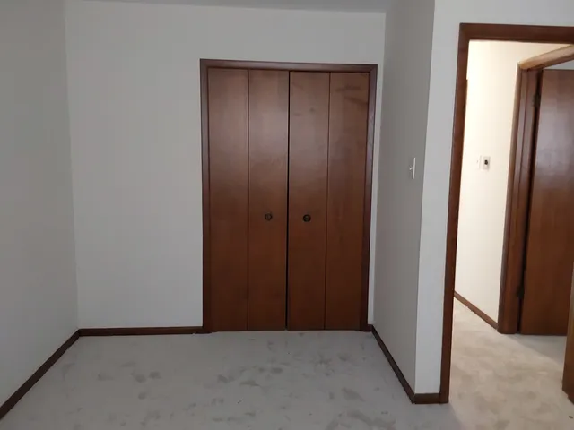 an empty room with closet