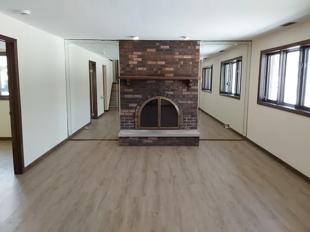 a view of a livingroom with a fireplace