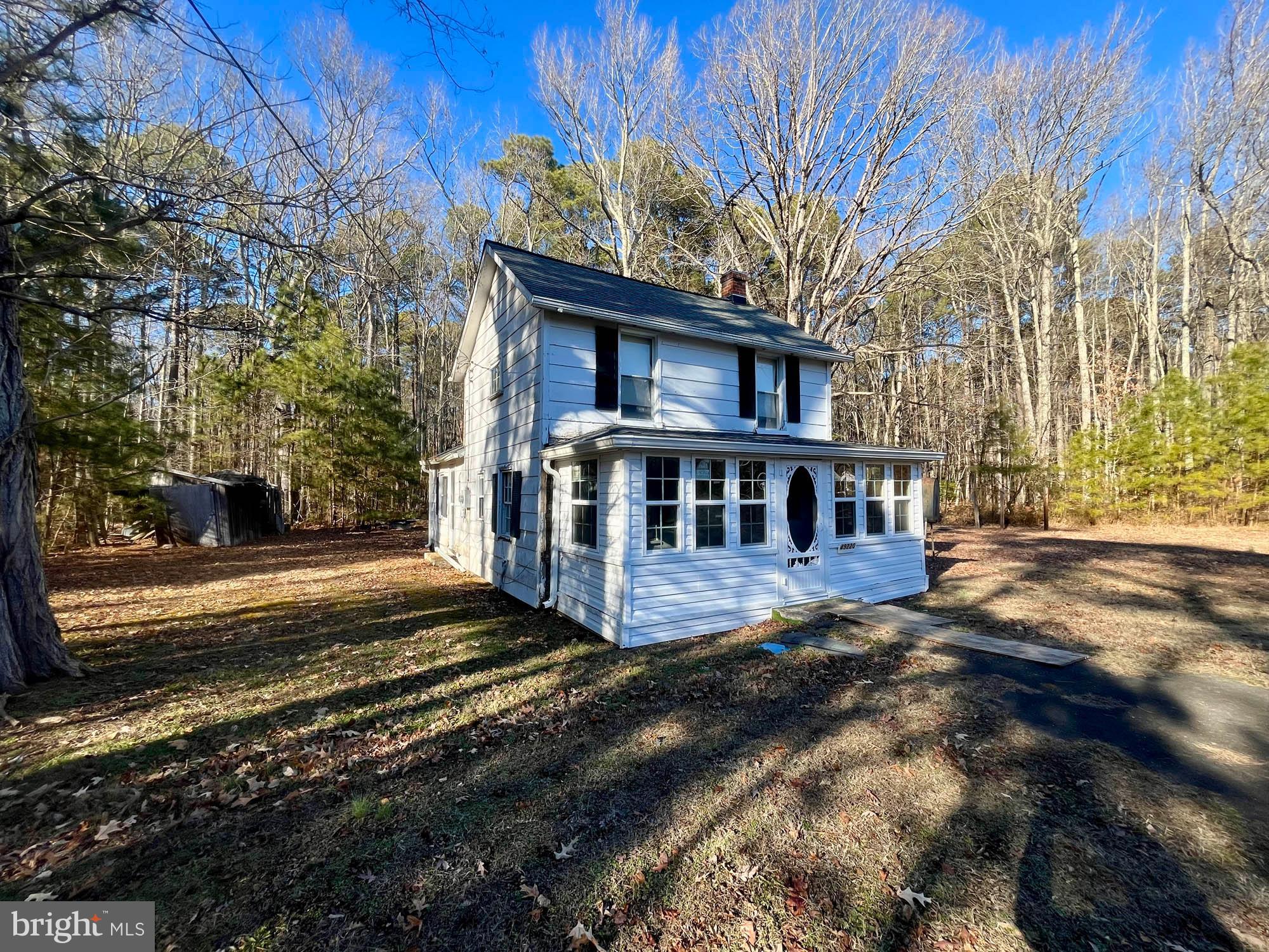 49220 Curleys Road Ridge, MD 20680 - Photo 4 of 24 a view of a house with a yard