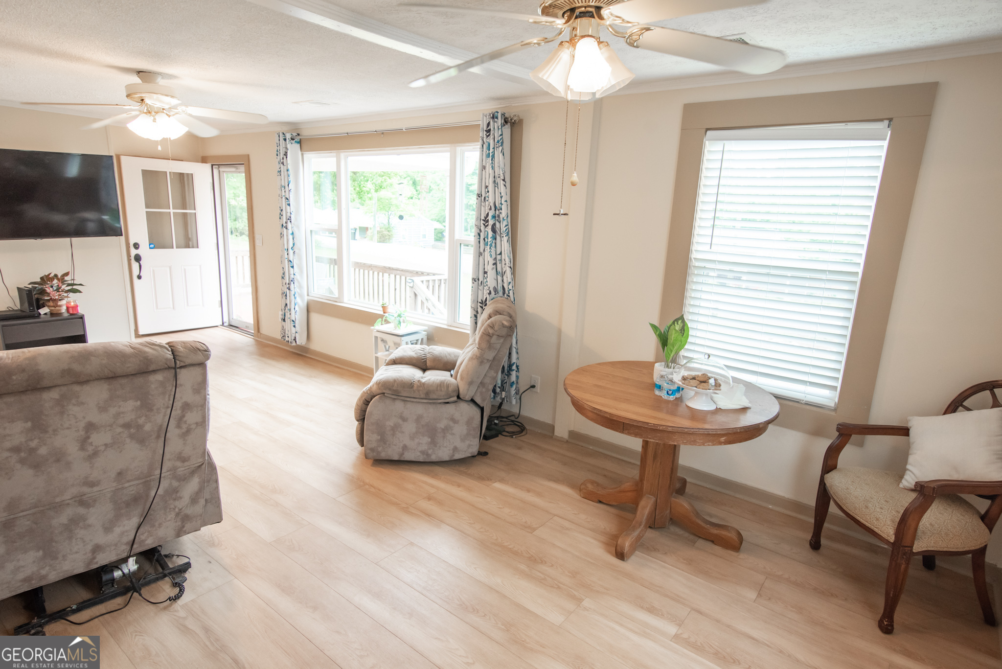 12 Bailey Drive Newnan, GA 30263 - Photo 12 of 35 a living room with furniture and a wooden floor