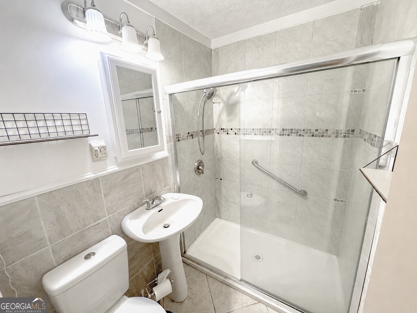 12 Bailey Drive Newnan, GA 30263 - Photo 21 of 35 a bathroom with a sink toilet and shower