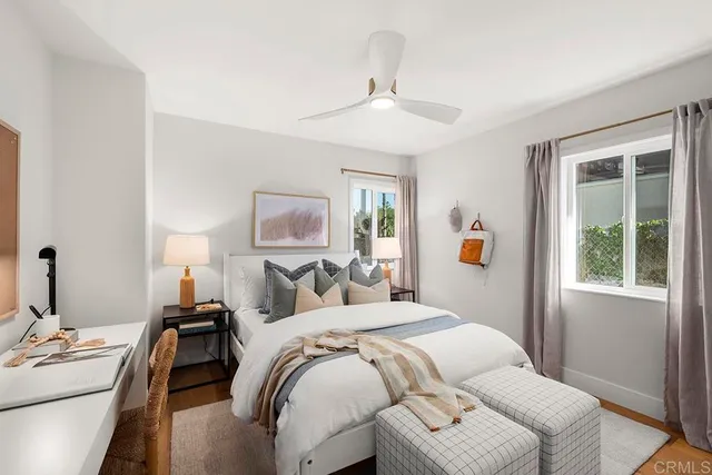 a view of washer and dryer with kitchen in the background