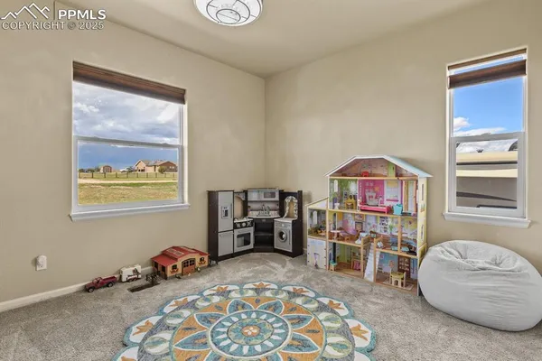 a room with furniture and a window