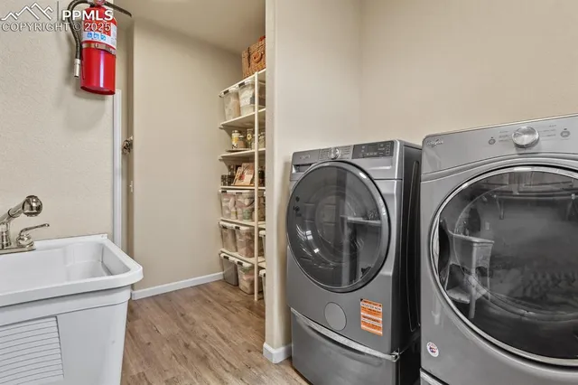 a utility room with dryer and washer