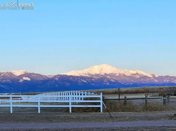 a view of house and mountain view
