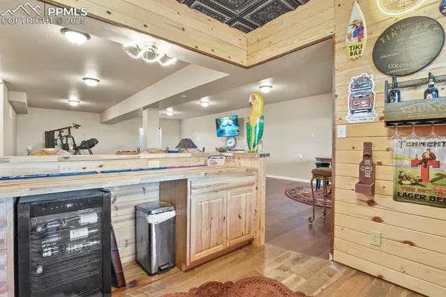 a kitchen with cabinets and window
