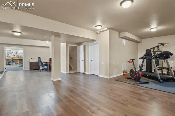 a view of a room with gym equipment