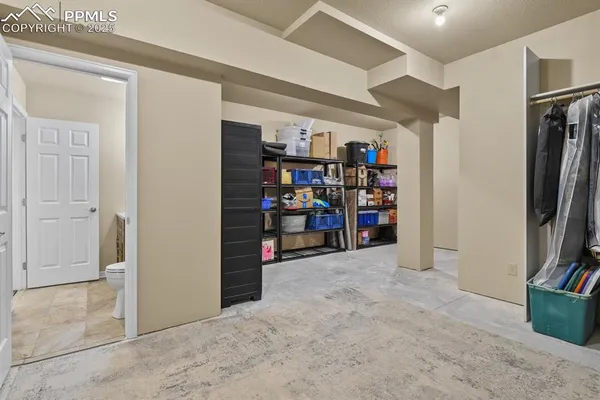 a view of a livingroom with shelves