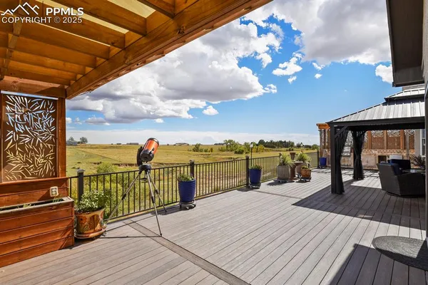 a view of a porch with seating space