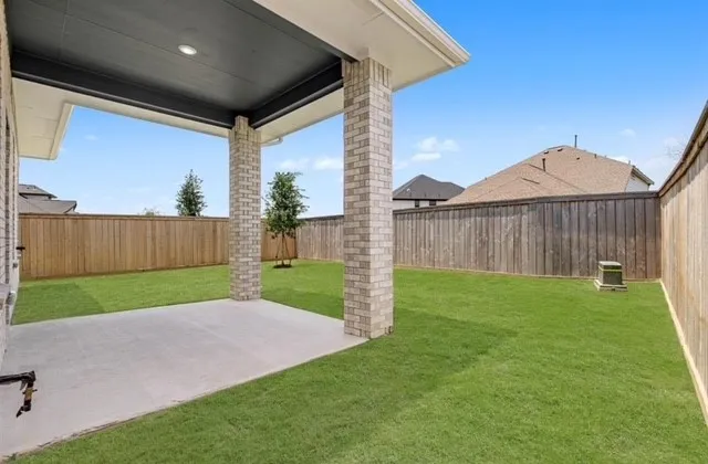 a view of a backyard with a garden