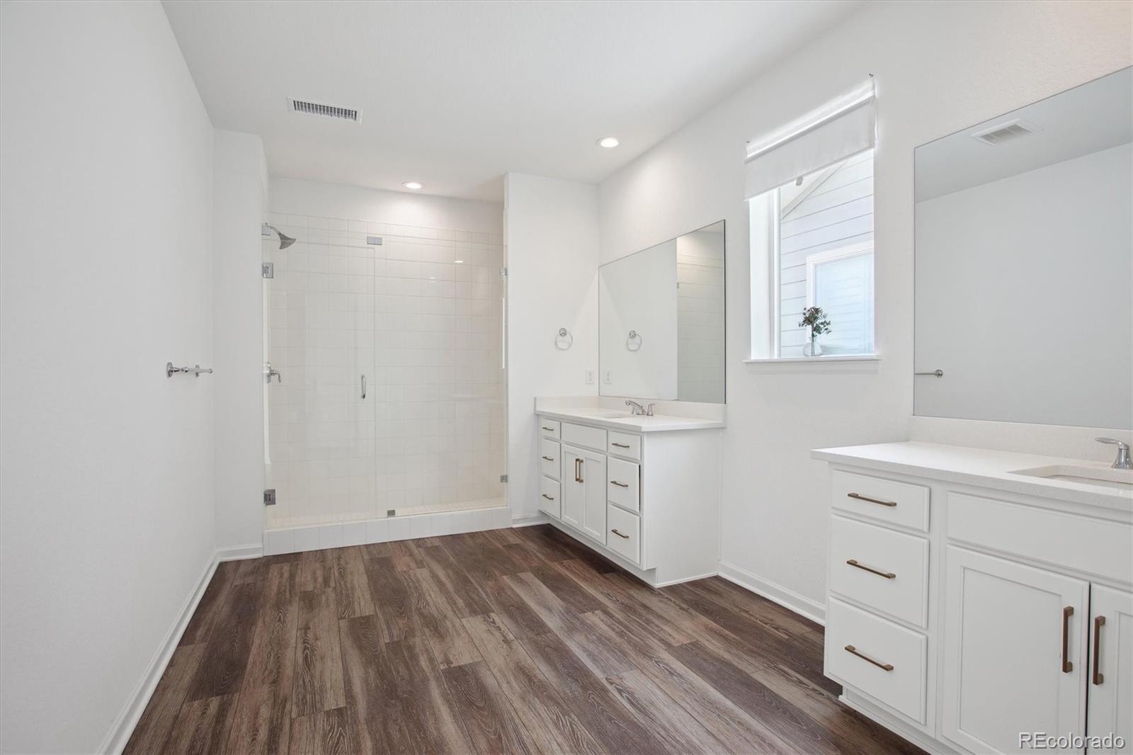 741 Simmental Loop Castle Rock, CO 80104 - Photo 26 of 50 a view of cabinets and wooden floor