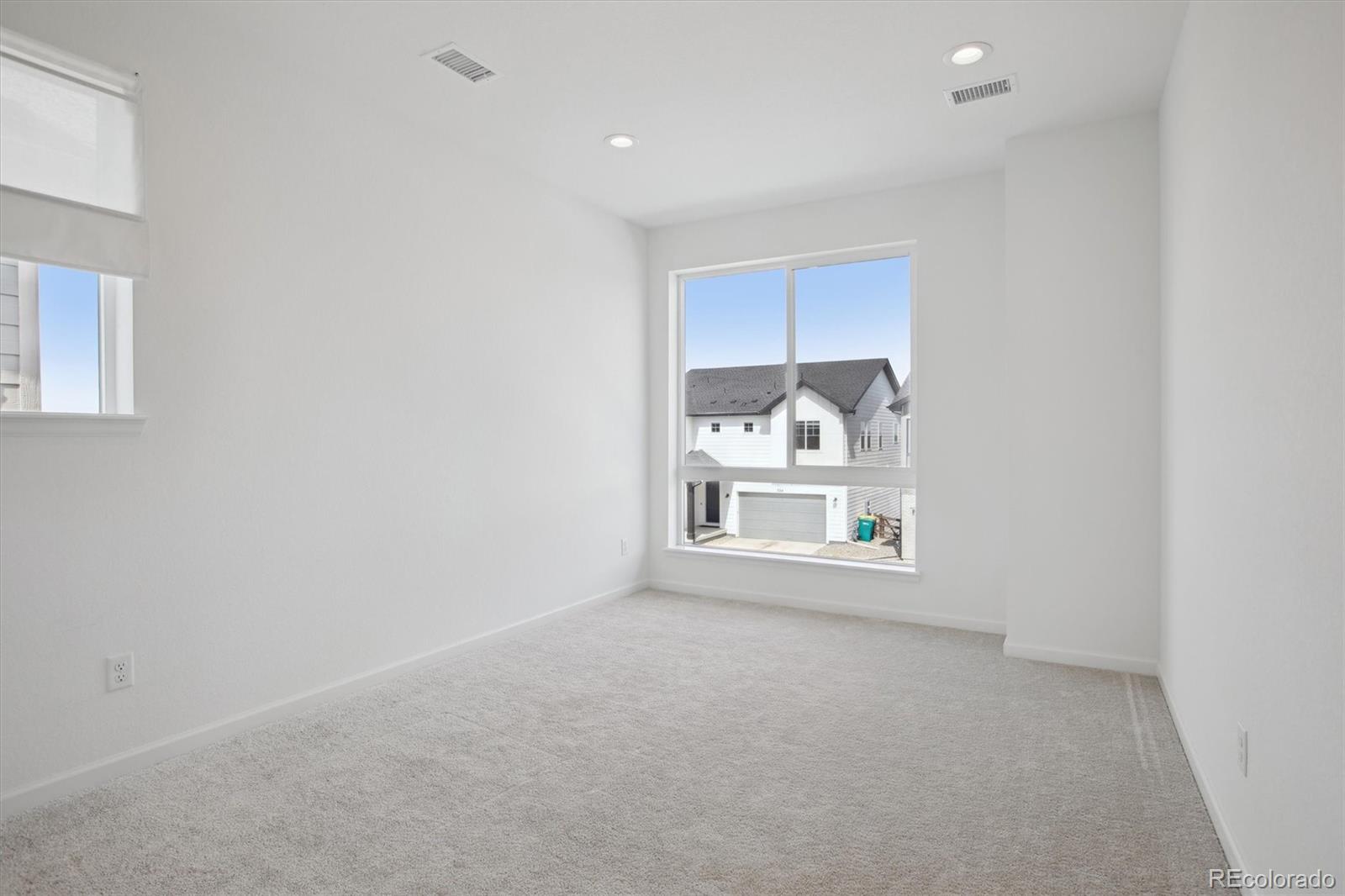 741 Simmental Loop Castle Rock, CO 80104 - Photo 33 of 50 an empty room with a window