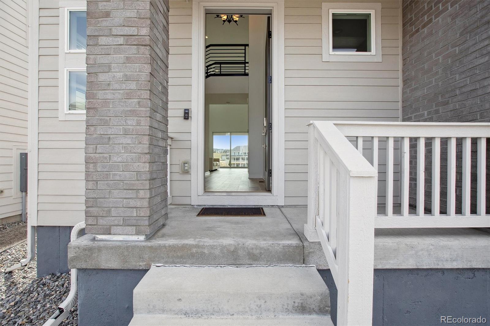 741 Simmental Loop Castle Rock, CO 80104 - Photo 4 of 50 a view of house and front door