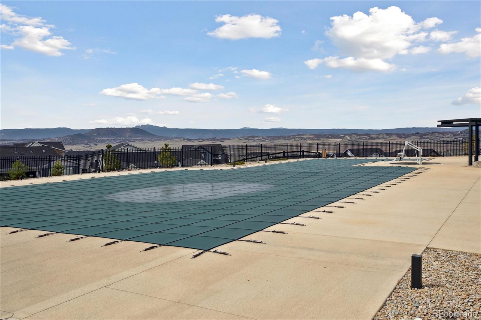 741 Simmental Loop Castle Rock, CO 80104 - Photo 48 of 50 a view of lake view and mountain view