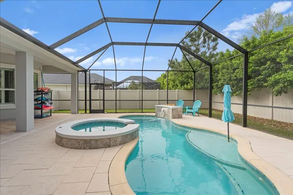 a front view of house with outdoor seating