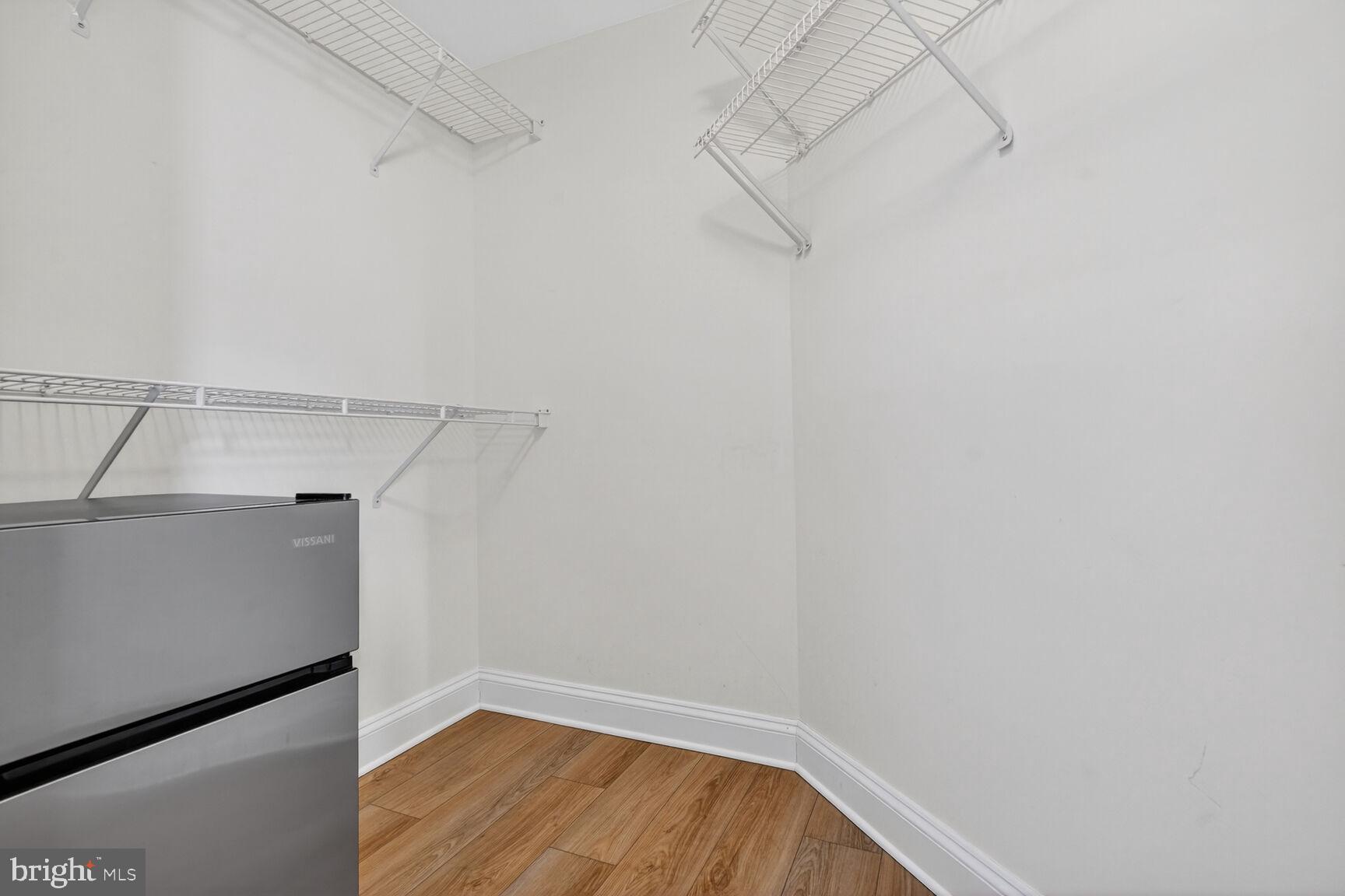 11776 Stratford House Place, Unit 1008 Reston, VA 20190 - Photo 37 of 66 Primary Walk-In Closet