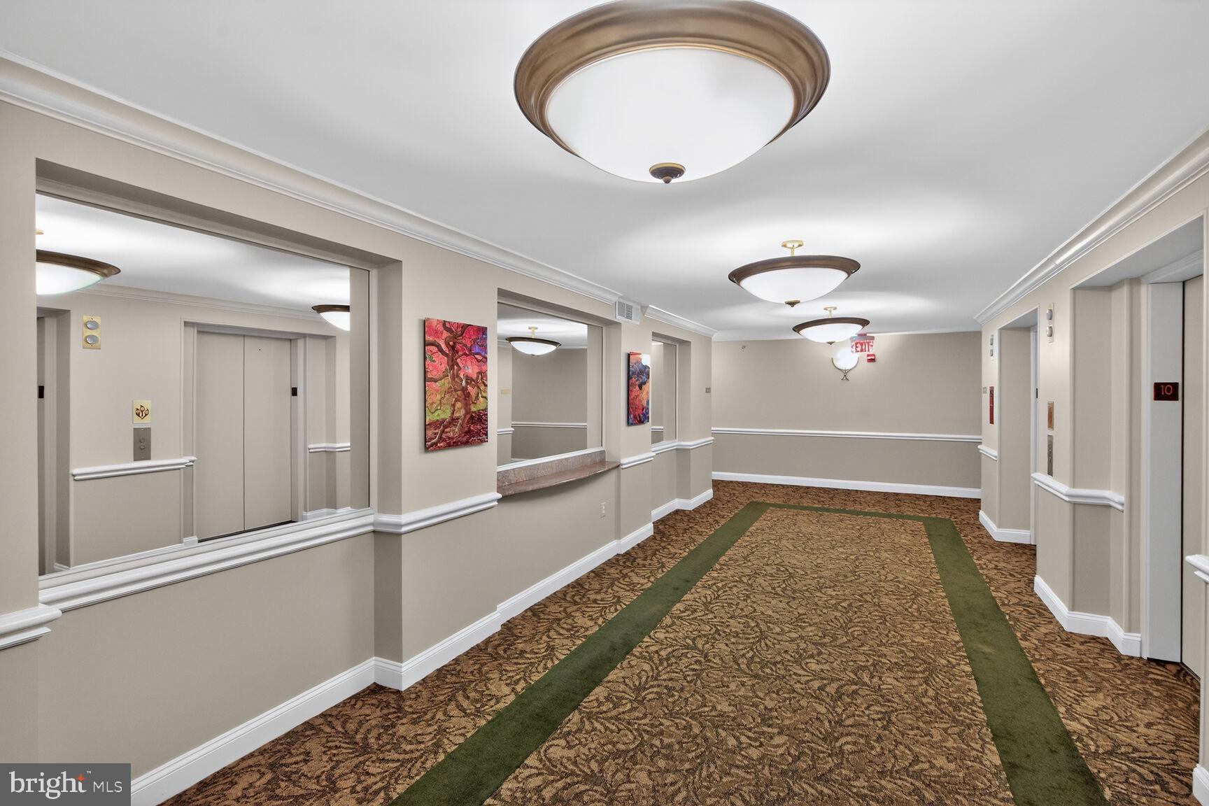 11776 Stratford House Place, Unit 1008 Reston, VA 20190 - Photo 7 of 66 10th Floor Hallway