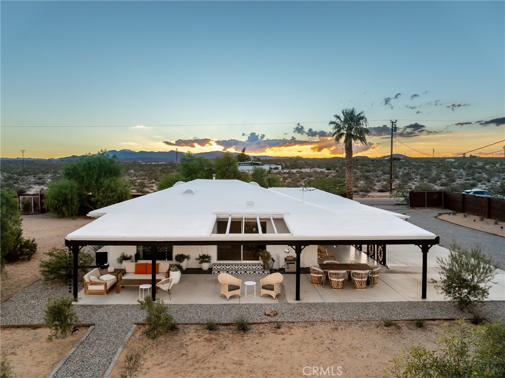 2837 Border Avenue Joshua Tree, CA 92252 - Photo 1 of 52 an aerial view of a house having patio