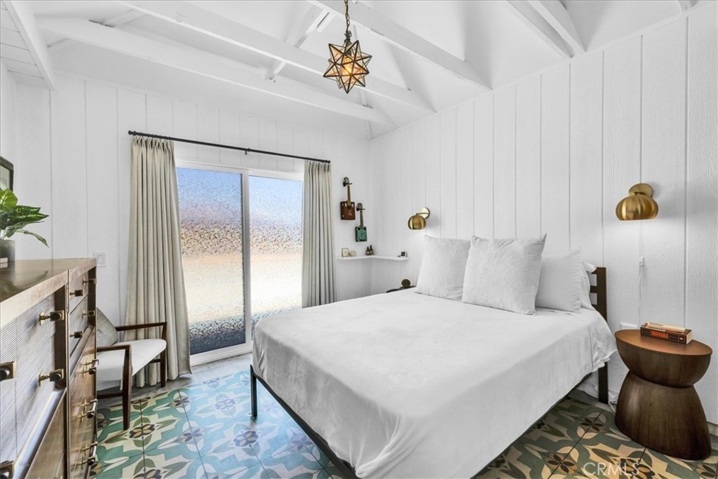 2837 Border Avenue Joshua Tree, CA 92252 - Photo 13 of 52 a bedroom with a bed and a mirror