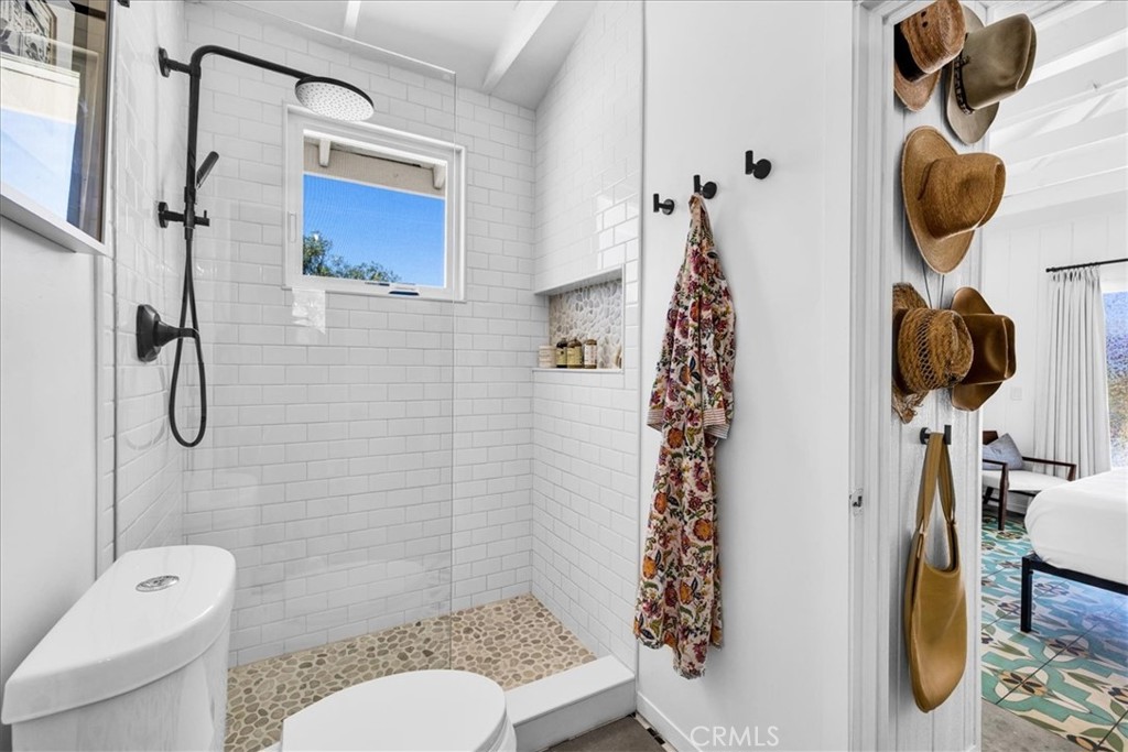 2837 Border Avenue Joshua Tree, CA 92252 - Photo 15 of 52 a bathroom with a sink toilet and shower