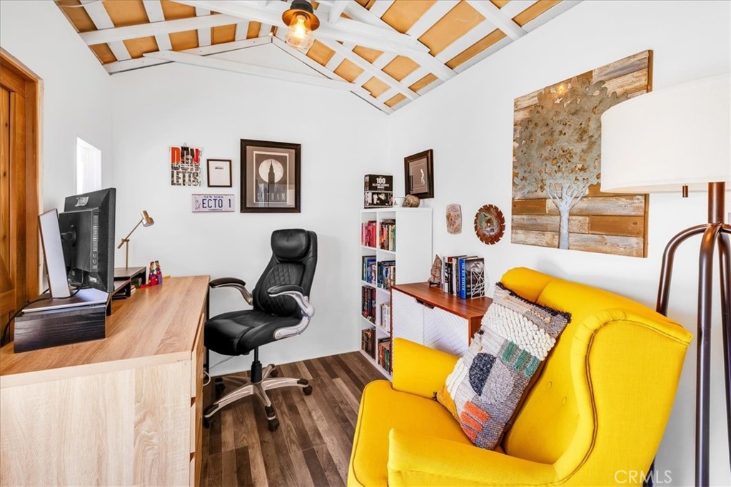 2837 Border Avenue Joshua Tree, CA 92252 - Photo 33 of 52 a living room with furniture and a flat screen tv