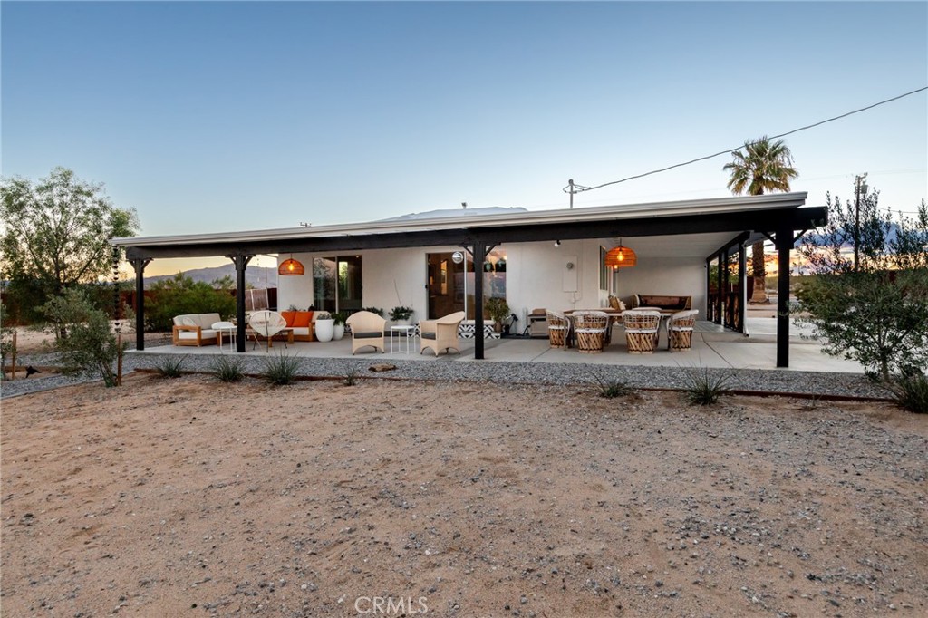2837 Border Avenue Joshua Tree, CA 92252 - Photo 37 of 52 a view of a street with a patio