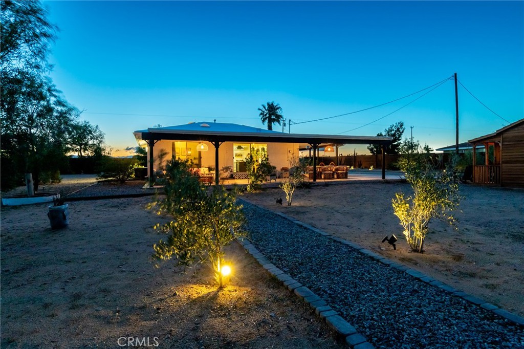 2837 Border Avenue Joshua Tree, CA 92252 - Photo 40 of 52 a swimming pool view with a garden