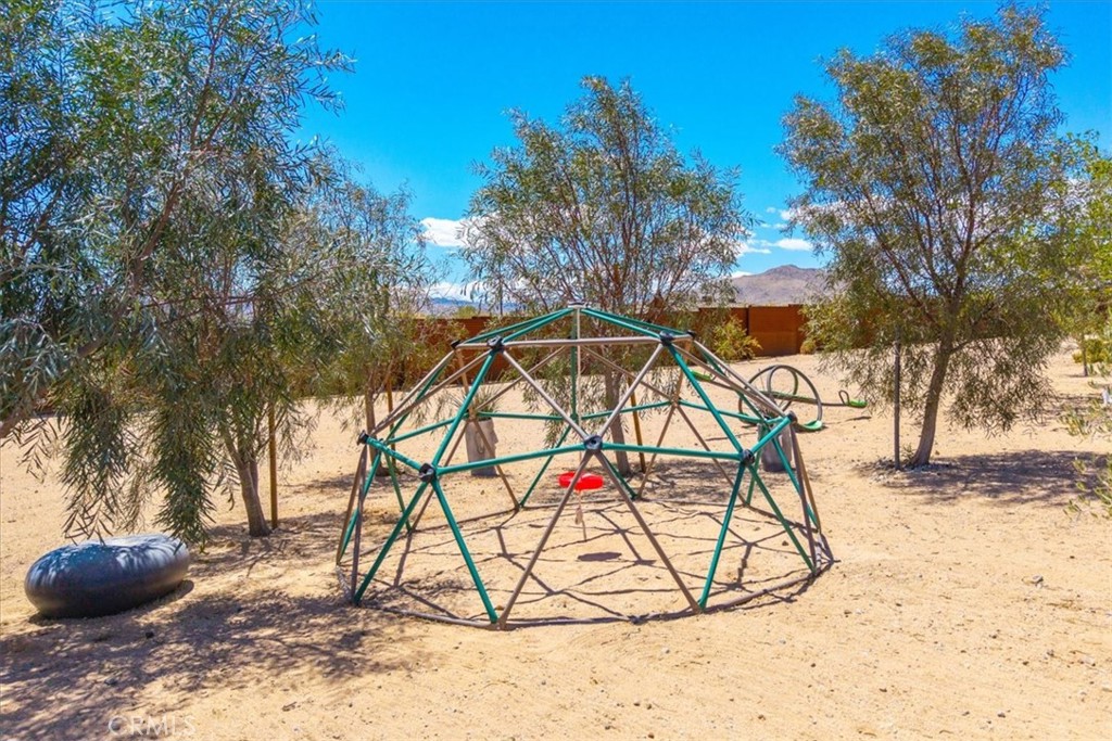 2837 Border Avenue Joshua Tree, CA 92252 - Photo 48 of 52 a view of a backyard of the house
