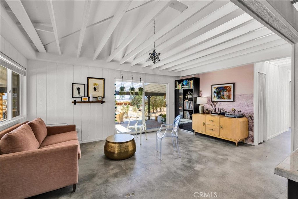 2837 Border Avenue Joshua Tree, CA 92252 - Photo 5 of 52 a living room with furniture and wooden floor