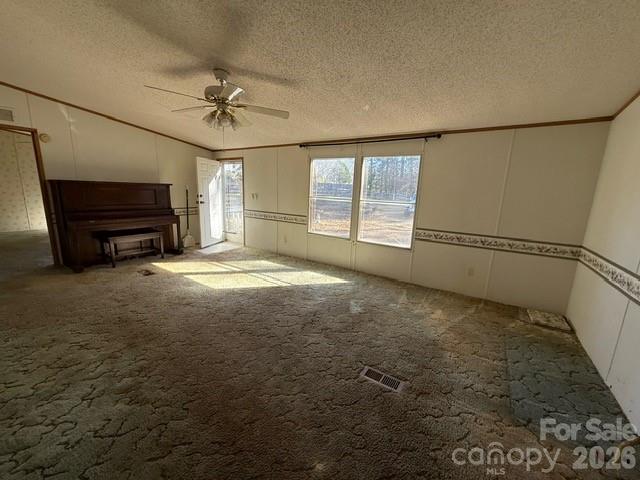 373 Griggs Road Clover, SC 29710 - Photo 13 of 41 a view of an empty room with a fireplace and a window