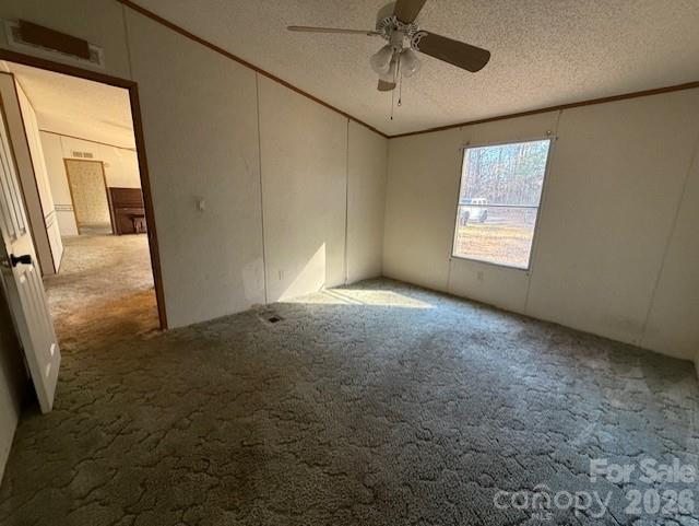 373 Griggs Road Clover, SC 29710 - Photo 19 of 41 a view of a livingroom with a ceiling fan and window