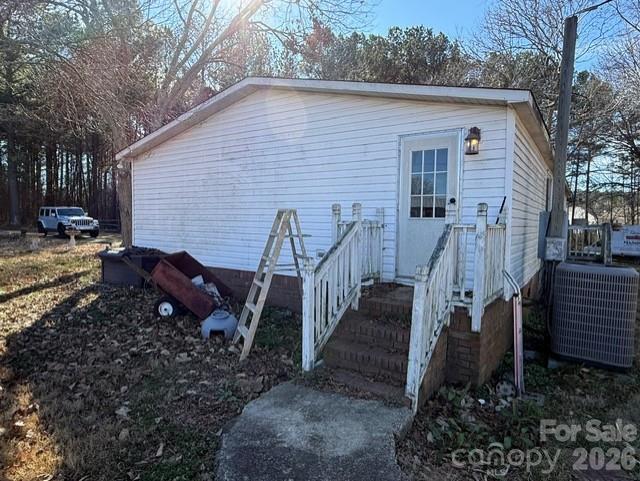 373 Griggs Road Clover, SC 29710 - Photo 2 of 41 a view of a house with backyard and trees