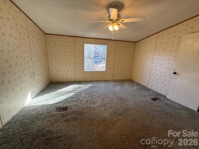 373 Griggs Road Clover, SC 29710 - Photo 35 of 41 en empty room with windows and ceiling fan