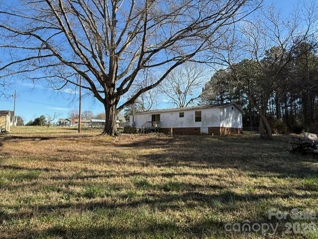 373 Griggs Road Clover, SC 29710 - Photo 8 of 41 a view of a yard with large trees