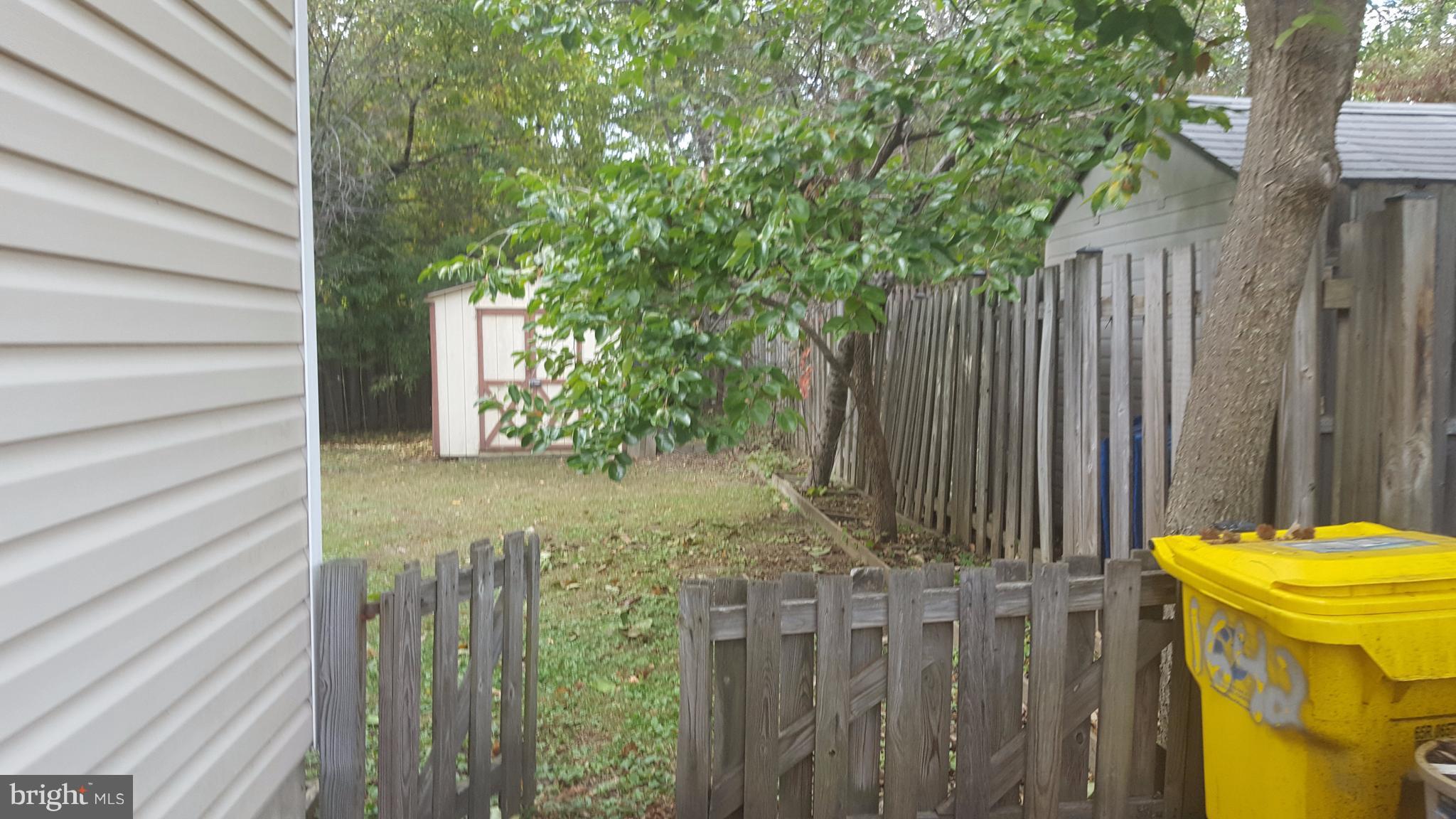 1642 Marlboro Road Edgewater, MD 21037 - Photo 23 of 27 a view of a backyard with pathway