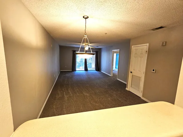 a bathroom with a double vanity sink toilet and shower
