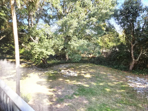 a view of a swimming pool from a balcony