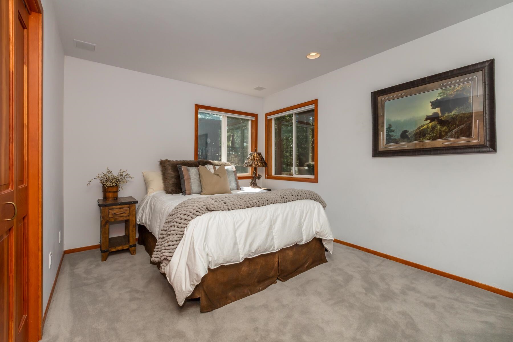 13213 Roundhill Drive Truckee, CA 96161 - Photo 11 of 21 a bedroom with a bed and a painting on the wall