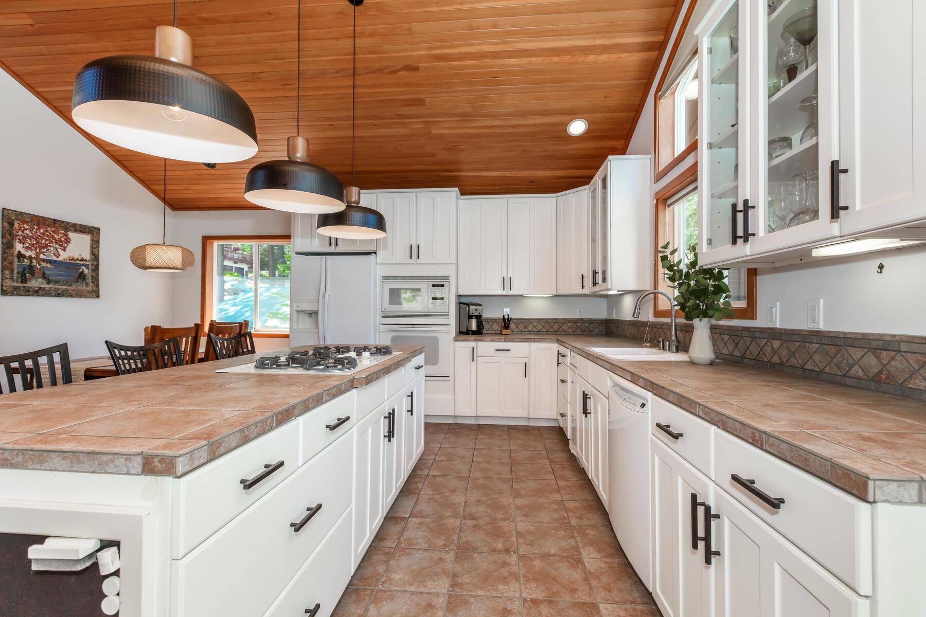 13213 Roundhill Drive Truckee, CA 96161 - Photo 5 of 21 a kitchen with stainless steel appliances granite countertop a stove and a sink