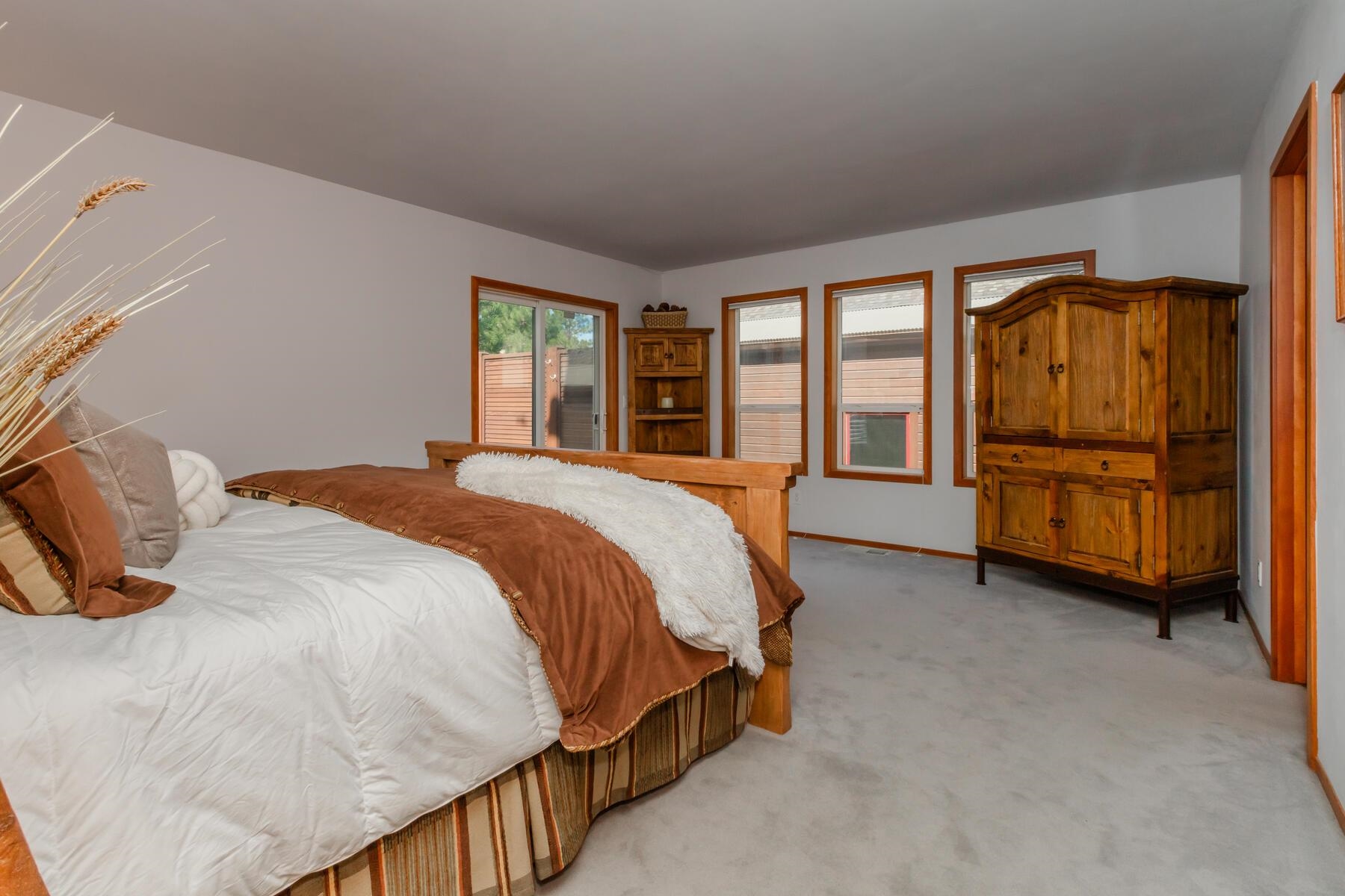 13213 Roundhill Drive Truckee, CA 96161 - Photo 8 of 21 a bed sitting in a spacious bedroom next to a window