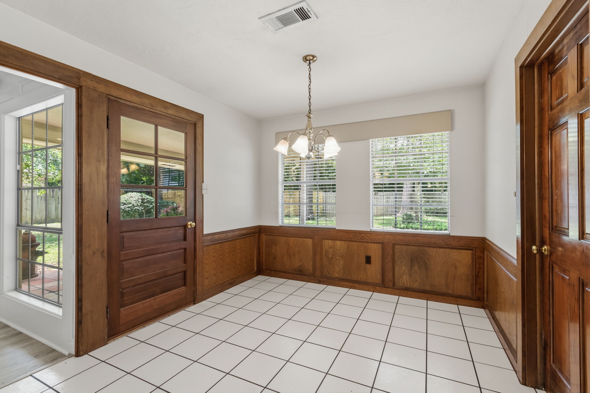 3422 Candlewisp Drive Spring, TX 77388 - Photo 14 of 50 BREAKFAST ROOM - The door on the left leads to the covered patio. The door on the right leads to the utility room.