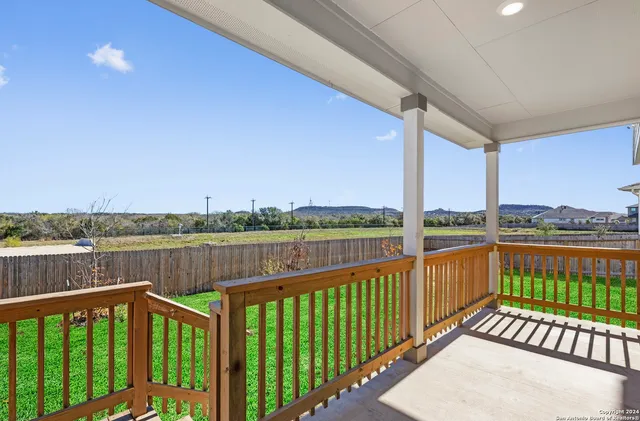 a view of a street view from a balcony