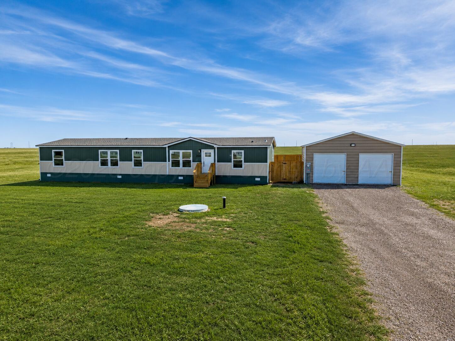 2680 Avery Rd Canyon Canyon, TX 79015 - Photo 2 of 37 a view of a house with a big yard
