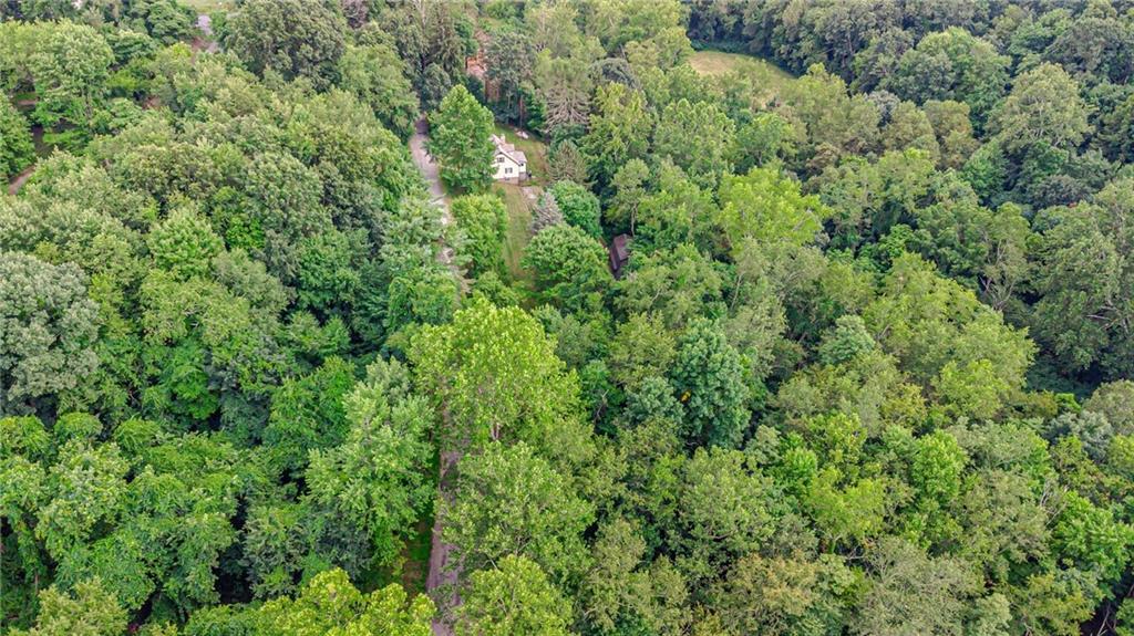 843 Brush Creek Road Penn, PA 15675 - Photo 14 of 22 an aerial view of residential house with outdoor space and trees all around